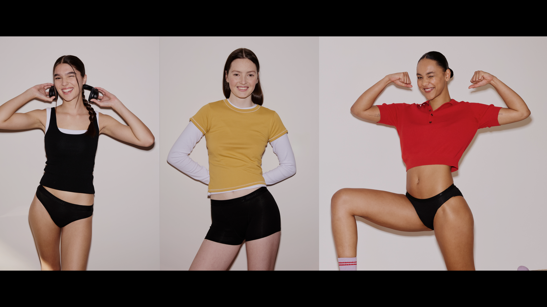 שלוש בחורות לובשות תחתוני מודיבודי ועומדות יחד בביטחון, לציון יום הווסת הבינלאומי (28.5) – תמונה המסמלת סולידריות נשית, ניפוץ סטיגמות ומודעות חיובית למחזור