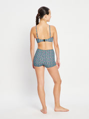 מכנסון בגד ים סופג לנערות בהדפס פרחוני שחור מבט מאחור. מידת הדוגמנית: Youth 10-12