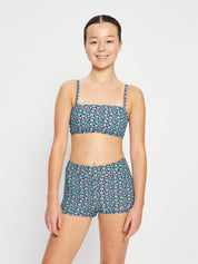 מכנסון בגד ים סופג לנערות בהדפס פרחוני שחור מבט מלפנים. מידת הדוגמנית: Youth 10-12